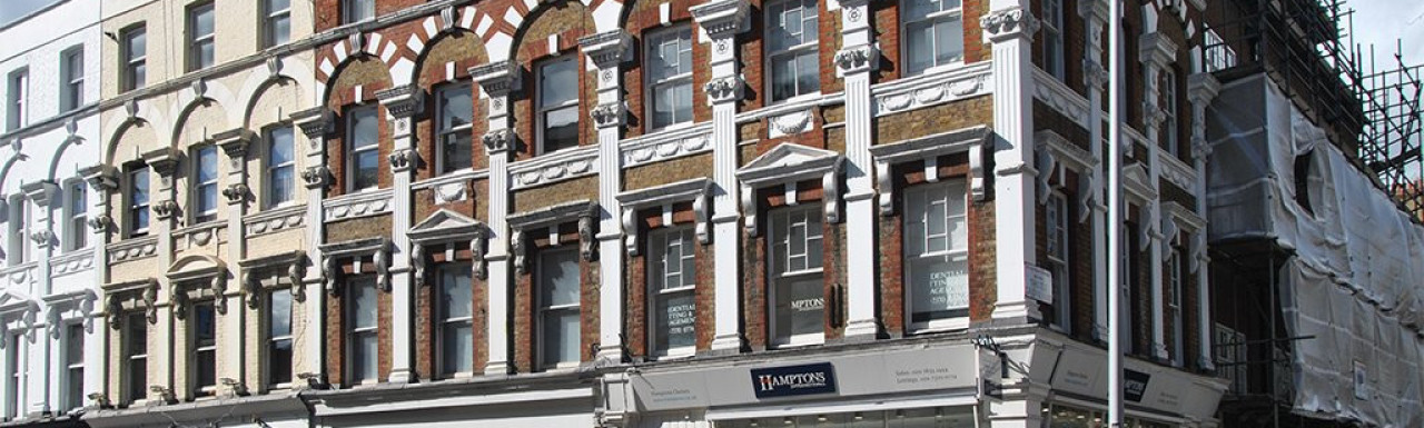 Estate agent Hamptons International offices on the corner of Fulham Road and Thistle Grove in March 2014.