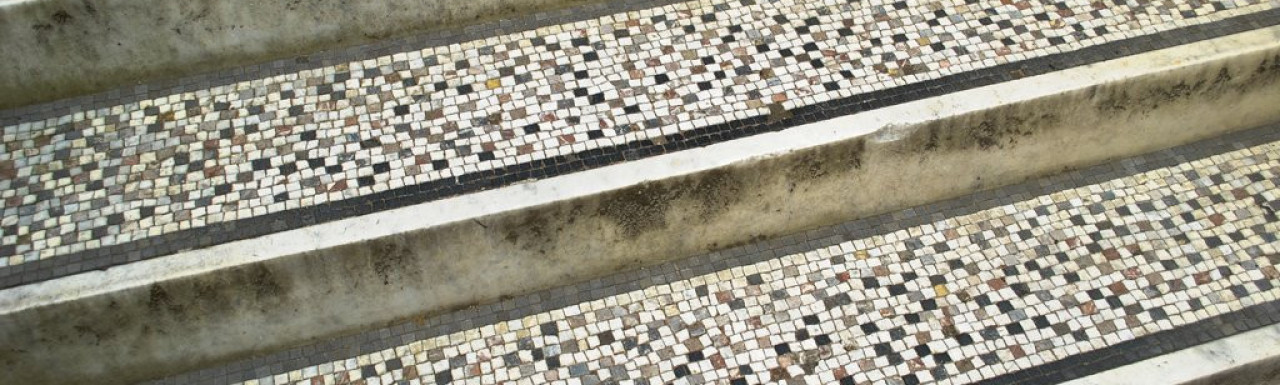 Tiled steps leading to 27 Palace Court in Bayswater, London W2.