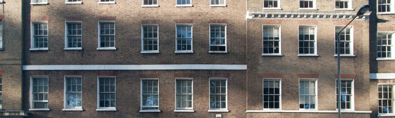 From right - 18, 20 and 22 Theobalds Road terraced houses in London WC1.