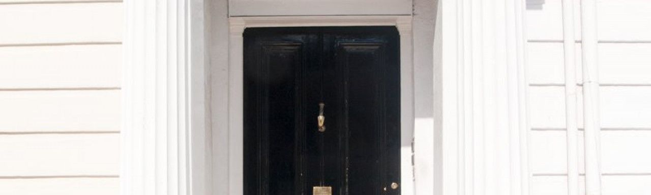 Two Doric columns at the entrance to No. Sixty Four - 64 Gloucester Terrace in Bayswater, London W2.