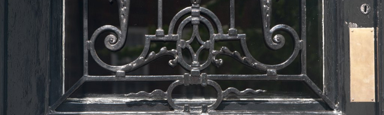 Wrought iron door decoration at 62 Gloucester Terrace in Bayswater, London W2.