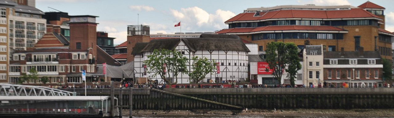 View to Shakespeare's Theatre from Victoria Embankment across the river 