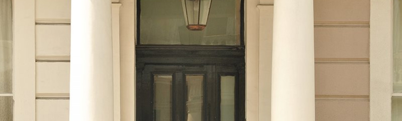 Tuscan columns at the front porch of 41 Queensborough Terrace building.