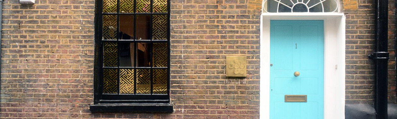 Ground floor window and door on the Newburgh Street side.