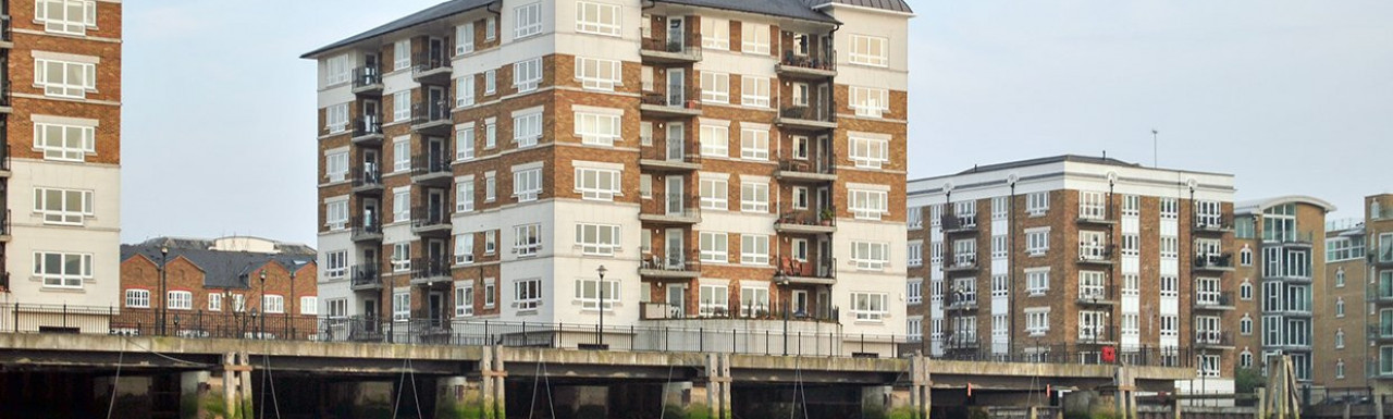 View to Woolcombes Court apartment building from the River Thames.