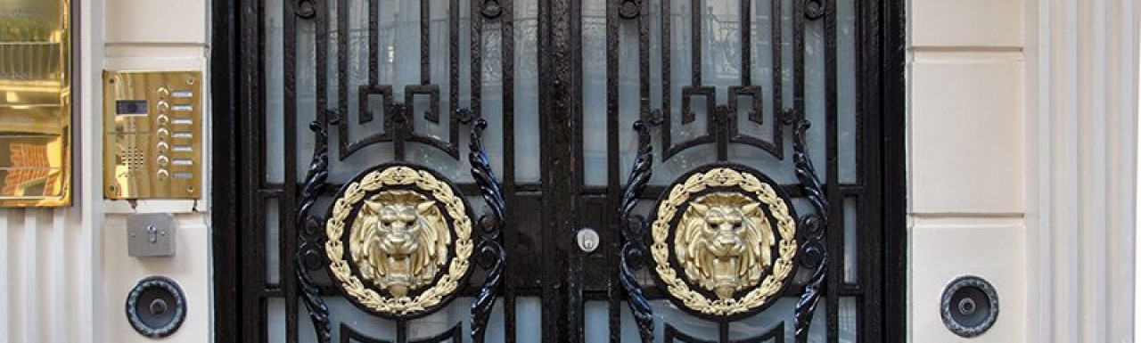Cast iron door at 22 Upper Brook Street in Mayfair, London W1.