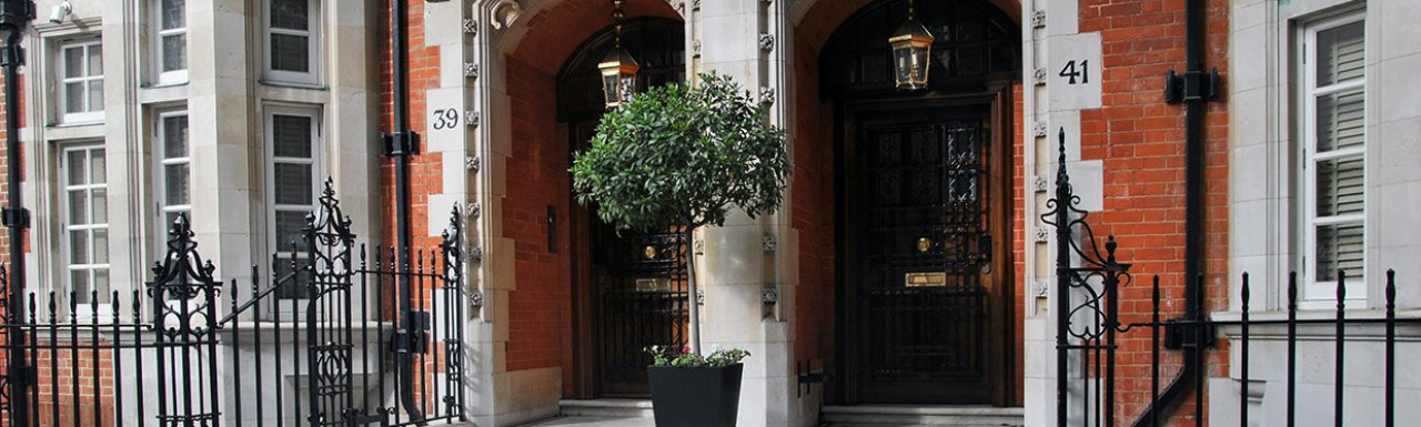 Entrance to 41 South Street next to no. 39 in Mayfair, London W1.