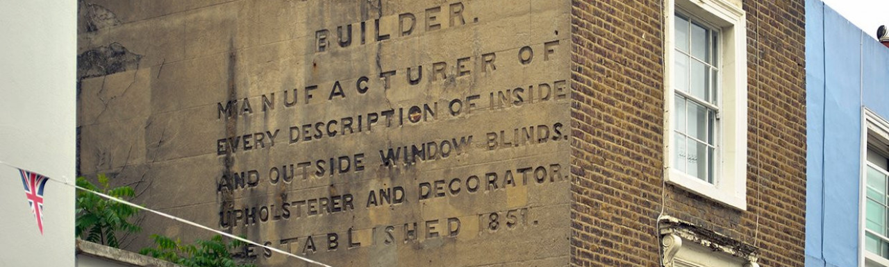 65 Portobello Road - A. Davey, builder. Manufacturer of every description of inside and outside window blinds. Upholsterer and decorator. Established 1851.