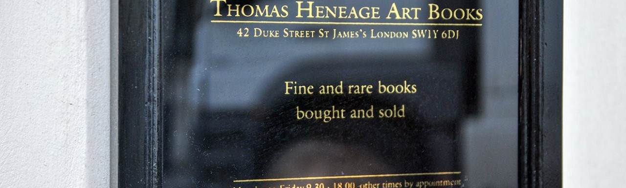 The sign on the building reads: Thomas Heneage Art Books - Fine and rare books bought and sold. Monday to Friday 9.30-18.00 other times by appointment.