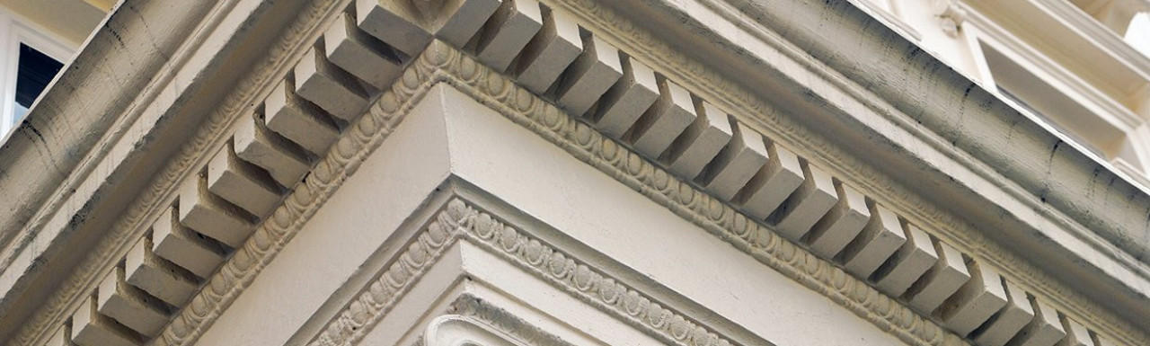 Ionic portico columns at 63 Queen's Gardens terraced house.