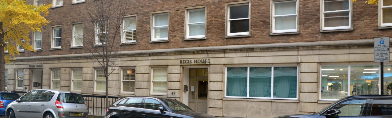 Entrance to Regis House apartments on Beaumont Street in Marylebone, London W1.