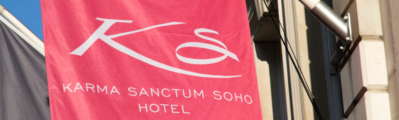 Karma Sanctum Soho Hotel flag at 20 Warwick Street building in Soho, London W1.