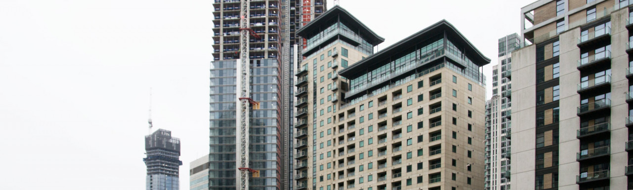 Discovery Dock East apartments next to South Quay Plaza under construction in 2019.