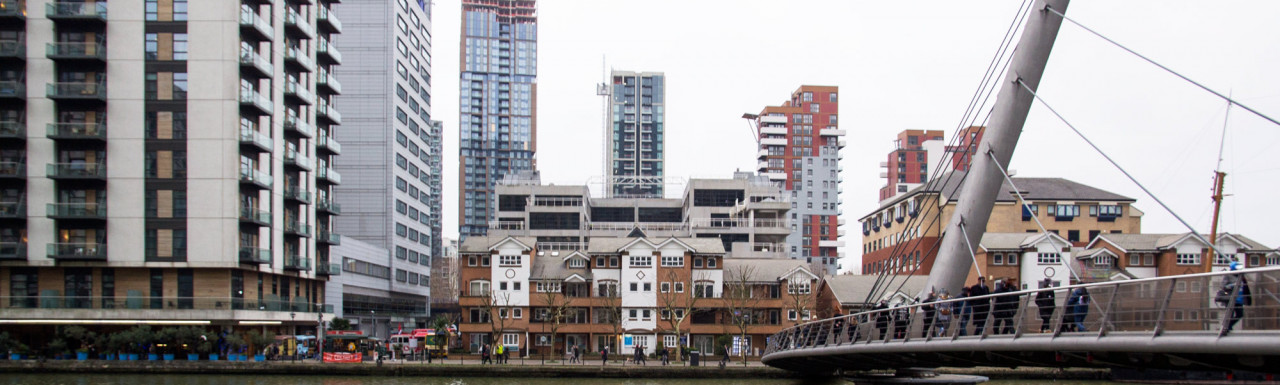Blake House in the middle, Raleigh House to the left, Laybourne House and South Quay Footbridge to the right.