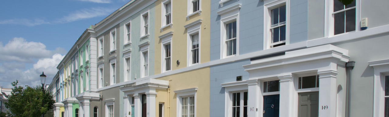 Grayish blue terraced house at 147 Elgin Crescent in London W11. 