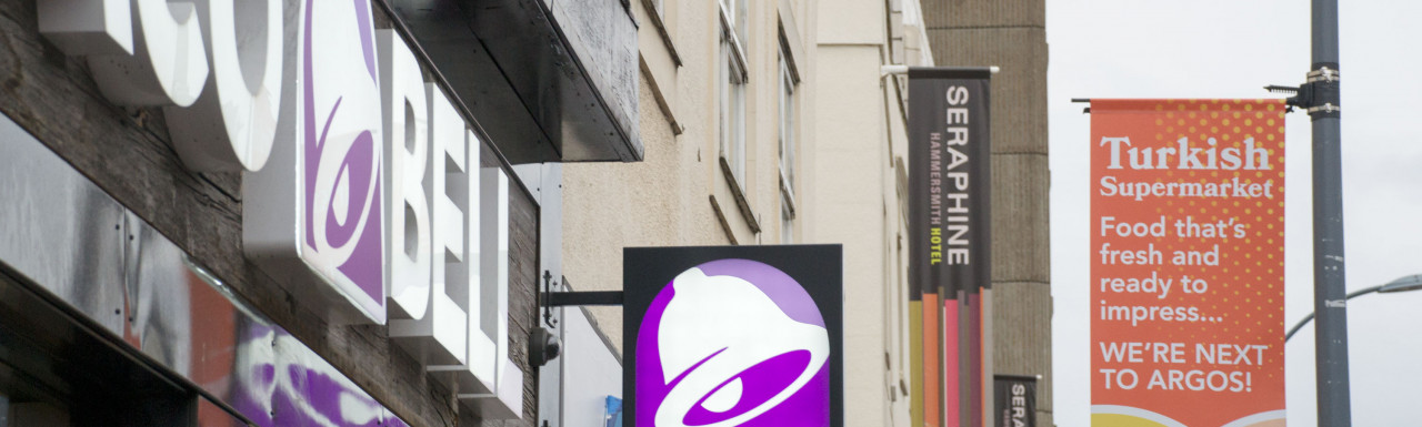 Taco Bell sign at 100 King Street in Hammersmith, London W6.