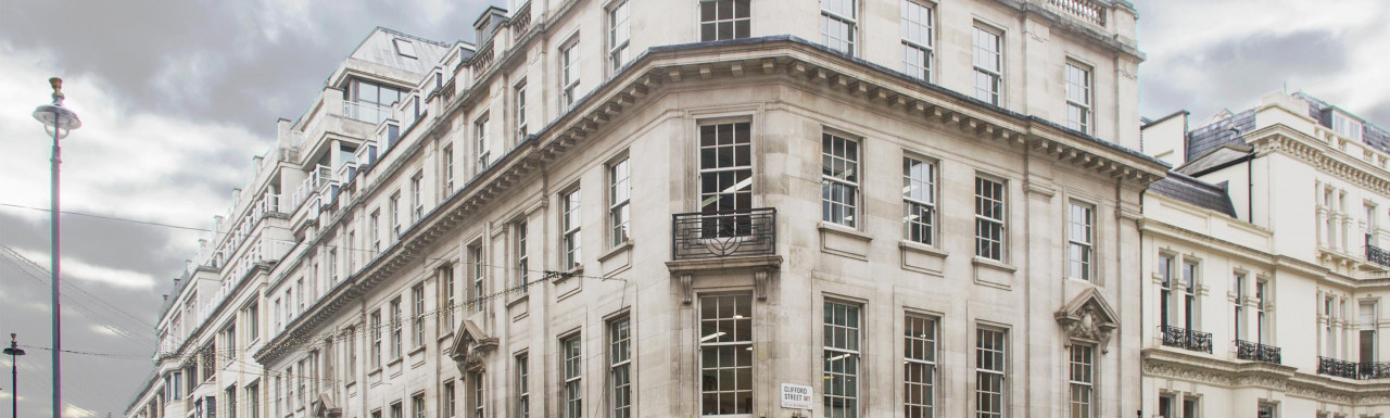 Ozwald Boateng windows on the corner of Savile Row & Clifford Street in Mayfair, London W1.