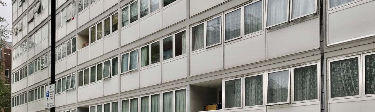 Holcroft Court flat windows facing Great Titchfield Street in Fitzrovia, London W1.