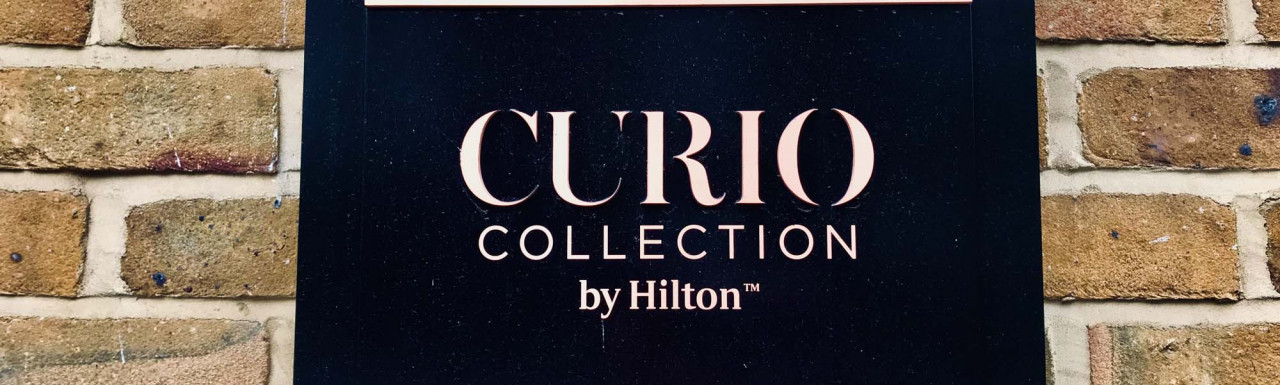 CURIO COLLECTION by Hilton sign at Hart Shoreditch Hotel London on Great Eastern Street.  