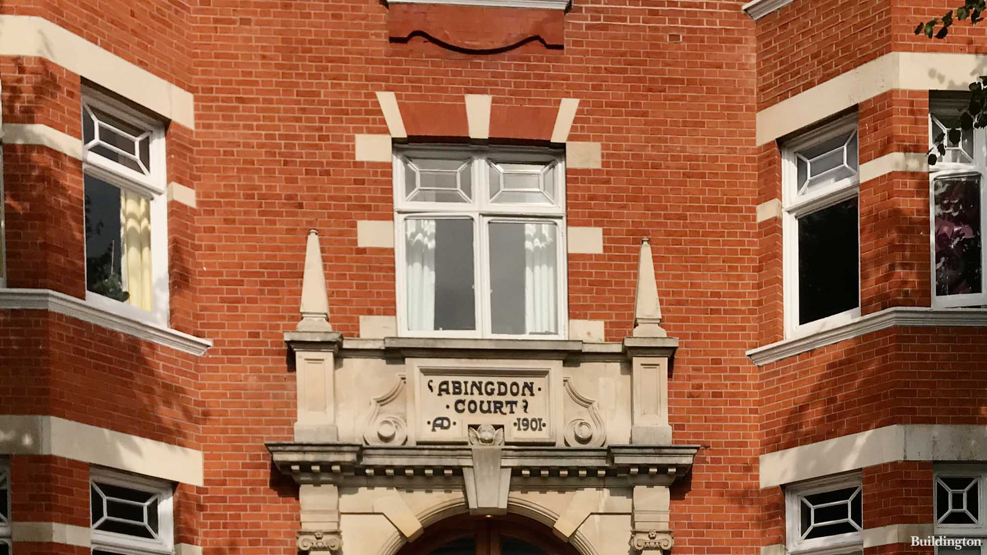 At one of the entrances to Abingdon Court mansion block flats in Kensington, which was built in 1901. 