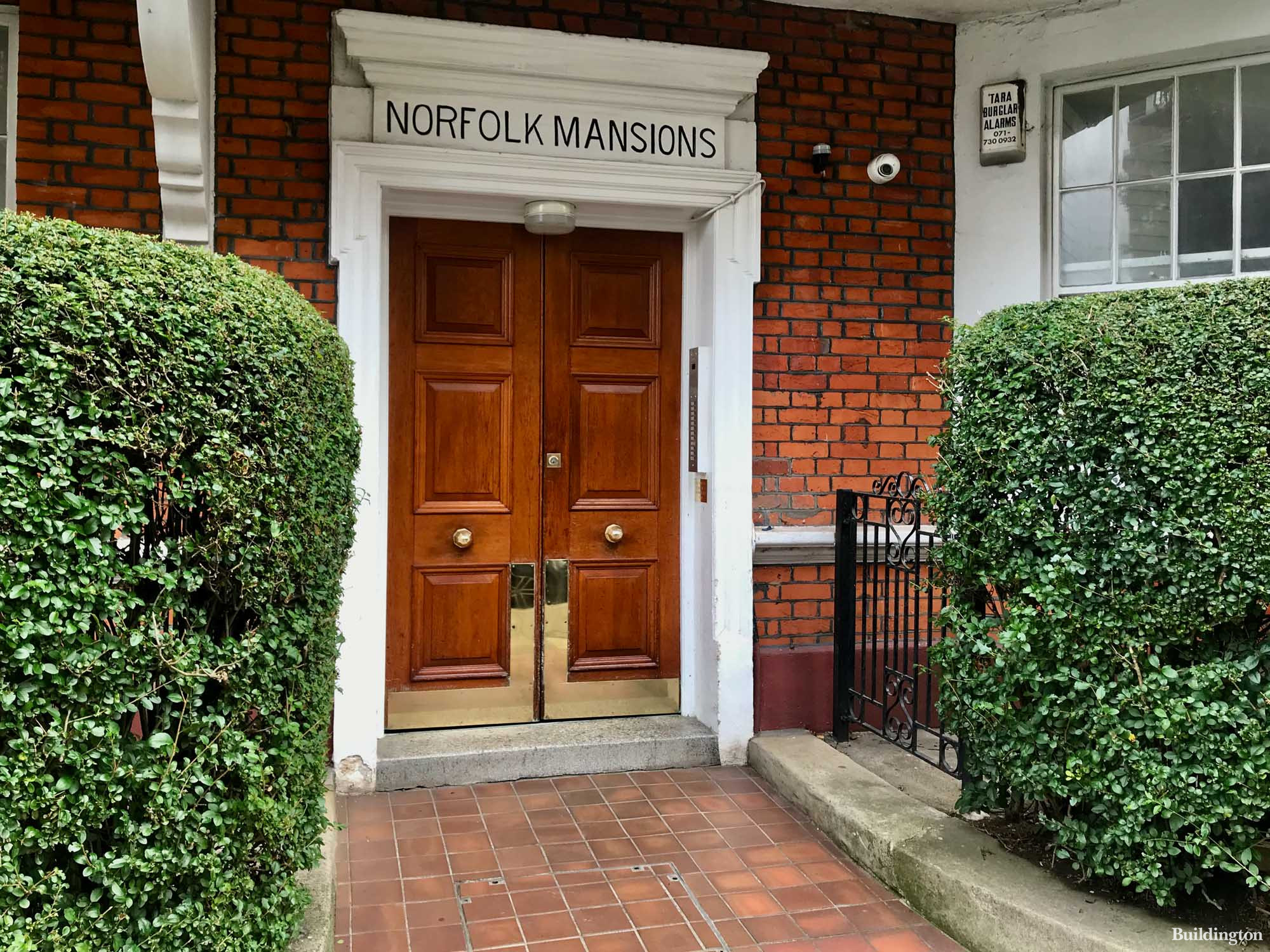One of the entrances to Norfolk Mansions on Kassala Road in Battersea, London SW11.