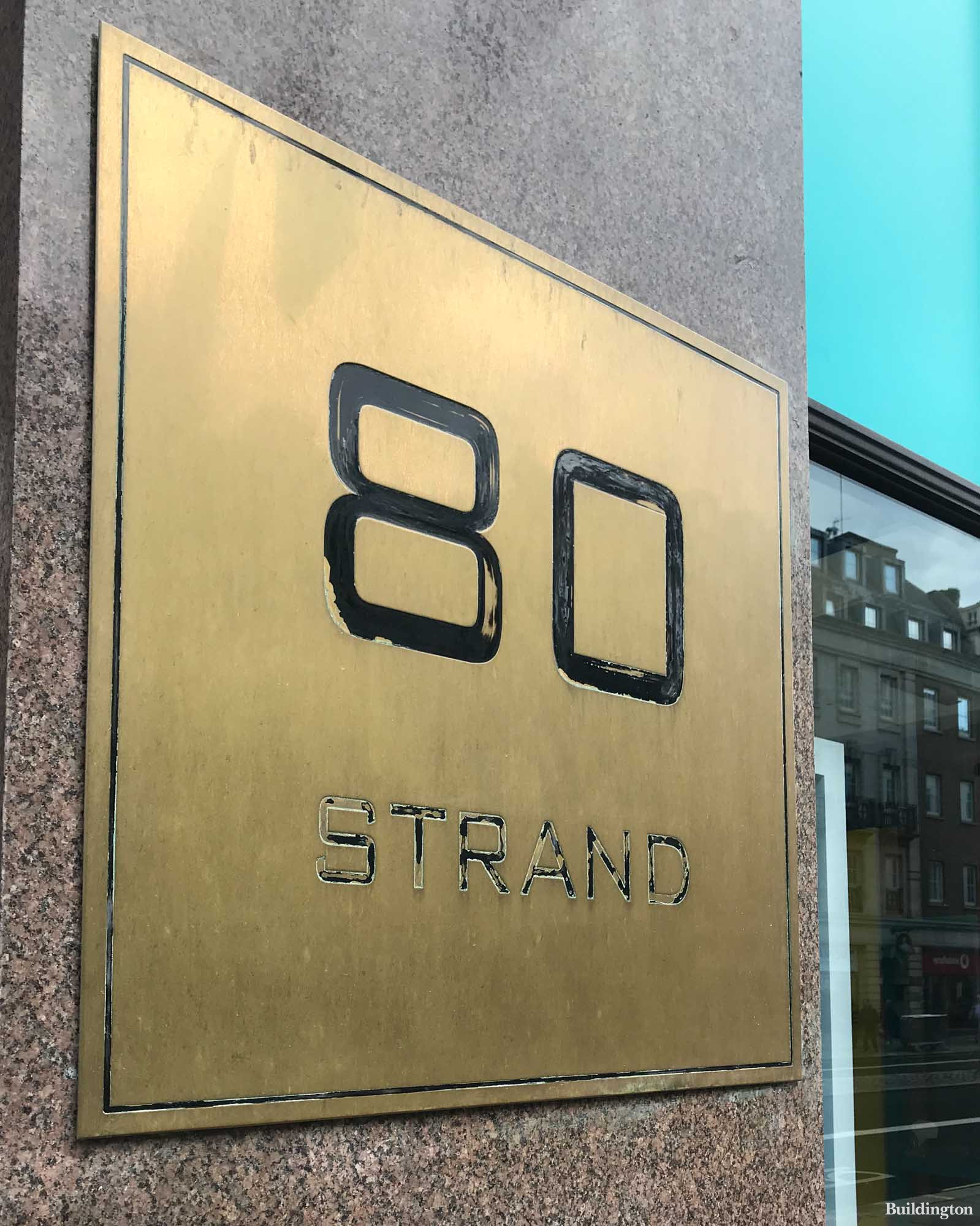 Eighty Strand building signage on Strand, London WC2.