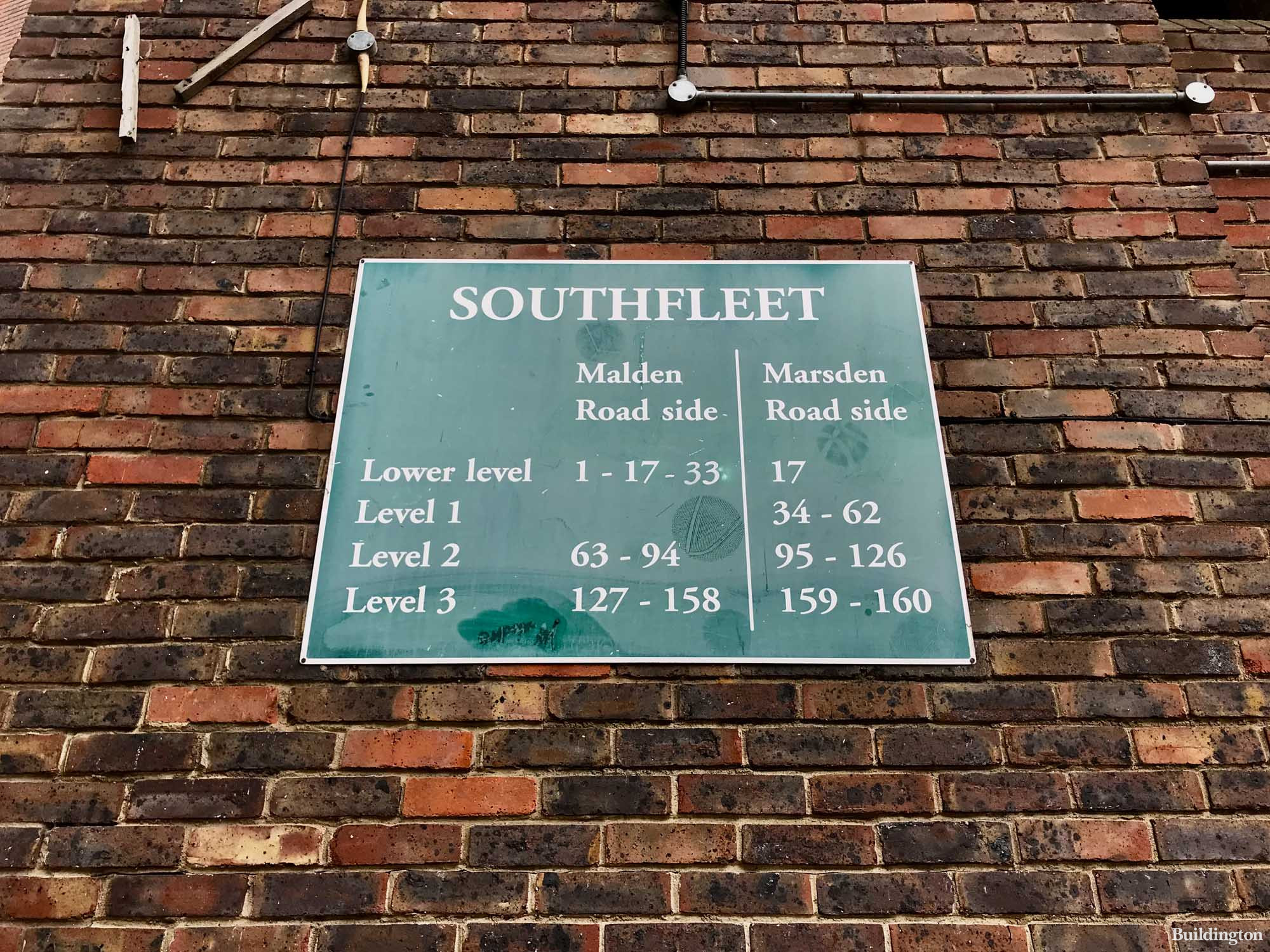 Southfleet flat numbers signage on Malden Road in London NW5