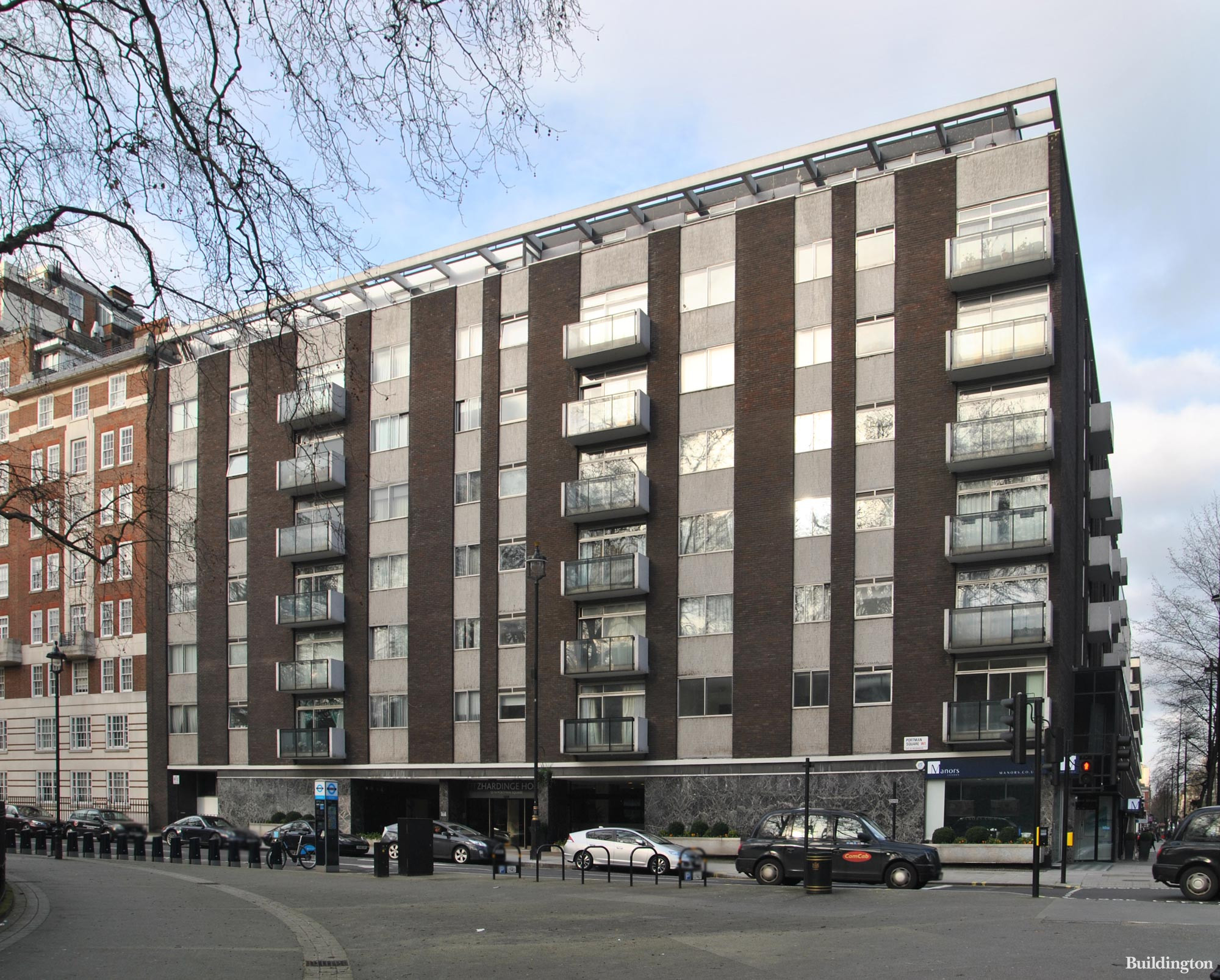Fitzhardinge House apartment block Portman Square elevation. Manors estate agents on the ground floor of the building.