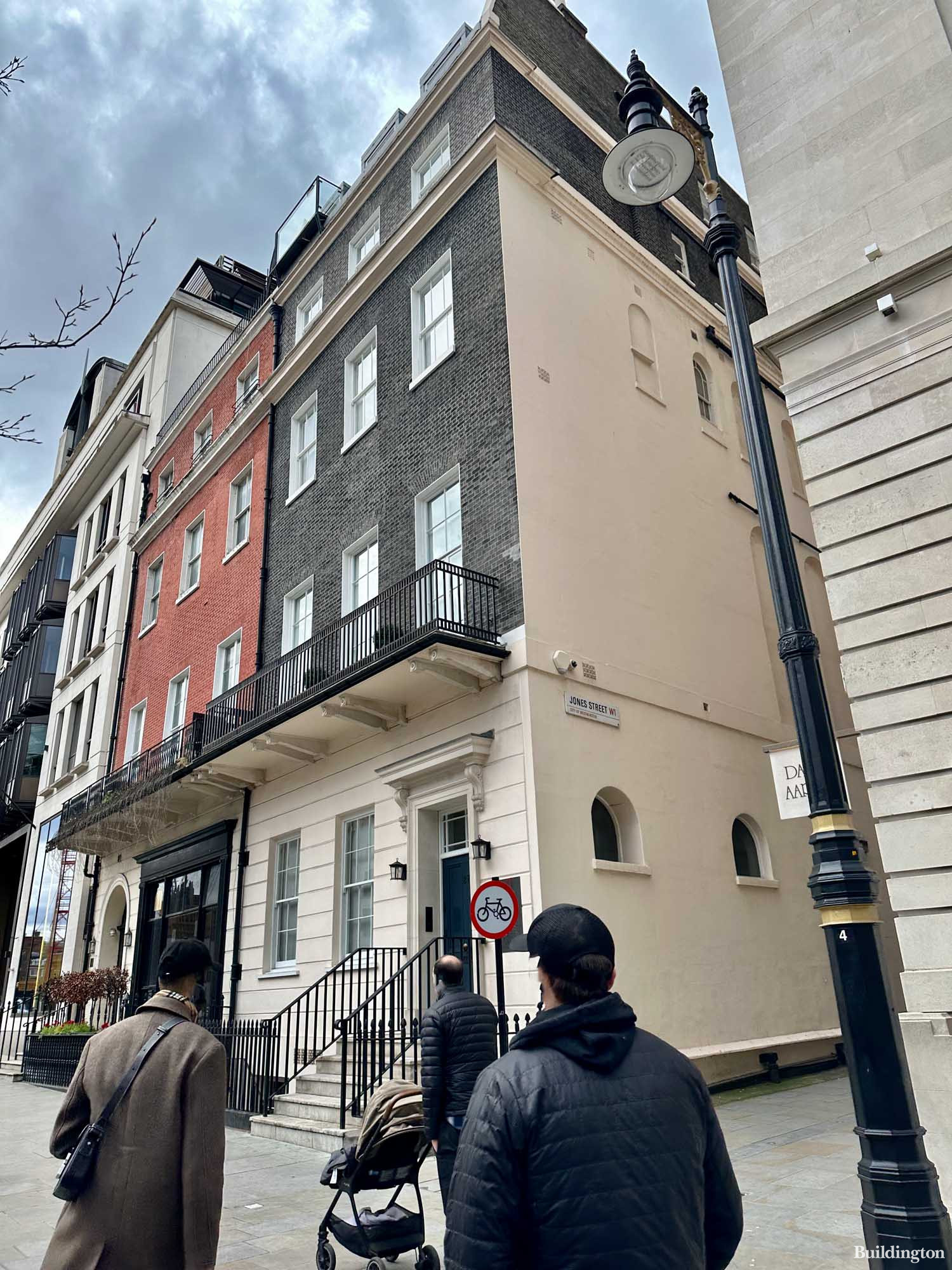 Exterior of 27 Berkeley Square building next to No. 25 (right) and No. 28 (left) in Mayfair, London W1.