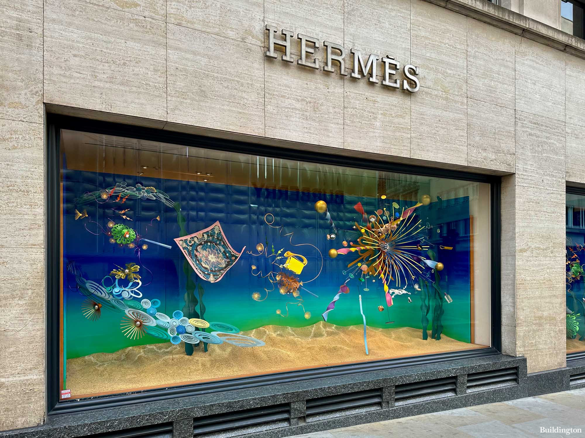 Hermès store window in Time & Life Building at 155 New Bond Street in Mayfair, London W1.