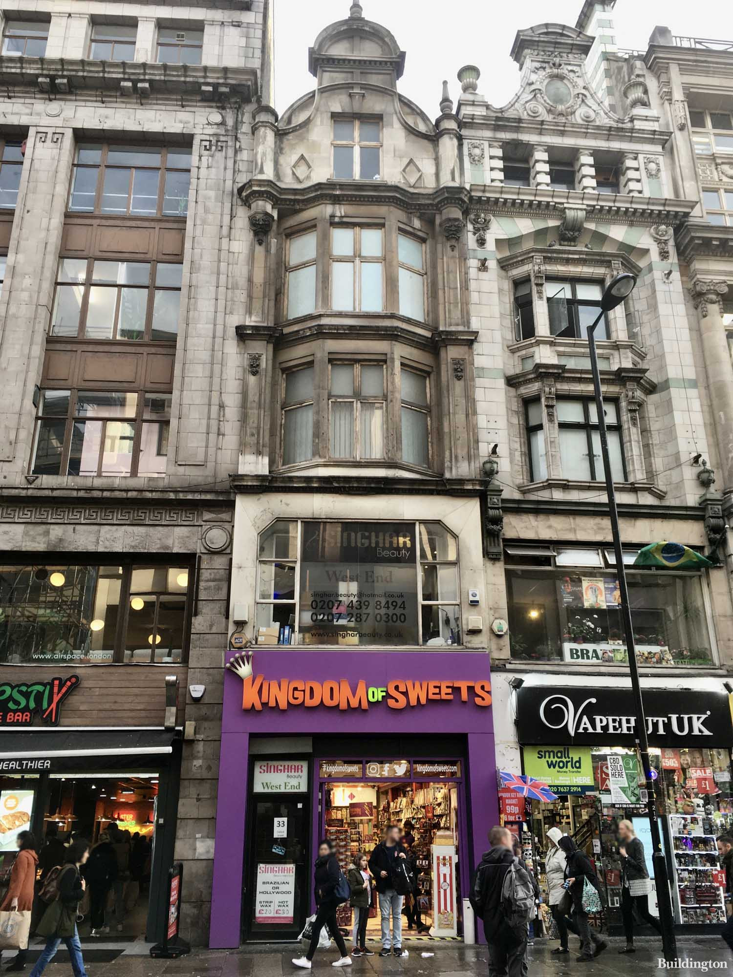 Kingdom of Sweets and Singhar Beauty at 33 Oxford Street building in Soho, London W1. Building exterior.