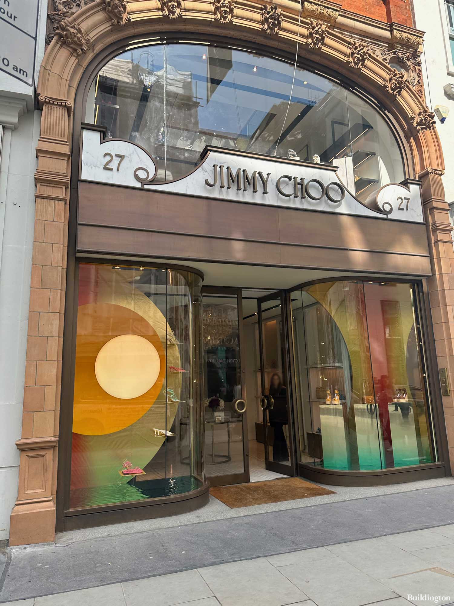 Jimmy Choo store entrance at 27 New Bond Street building in Mayfair, London W1.