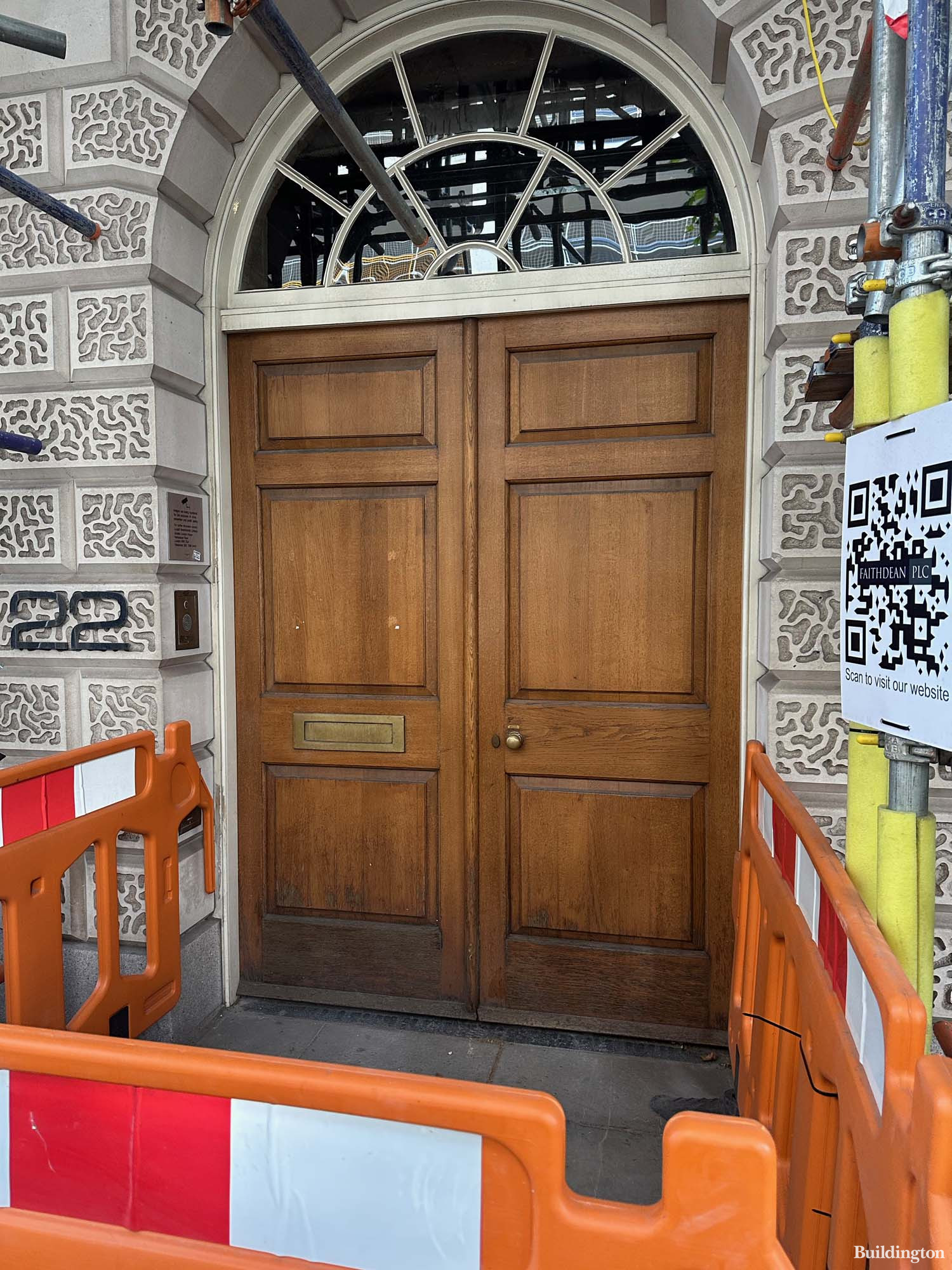 Entrance to No. 22 Baker Street building in Marylebone, London W1.