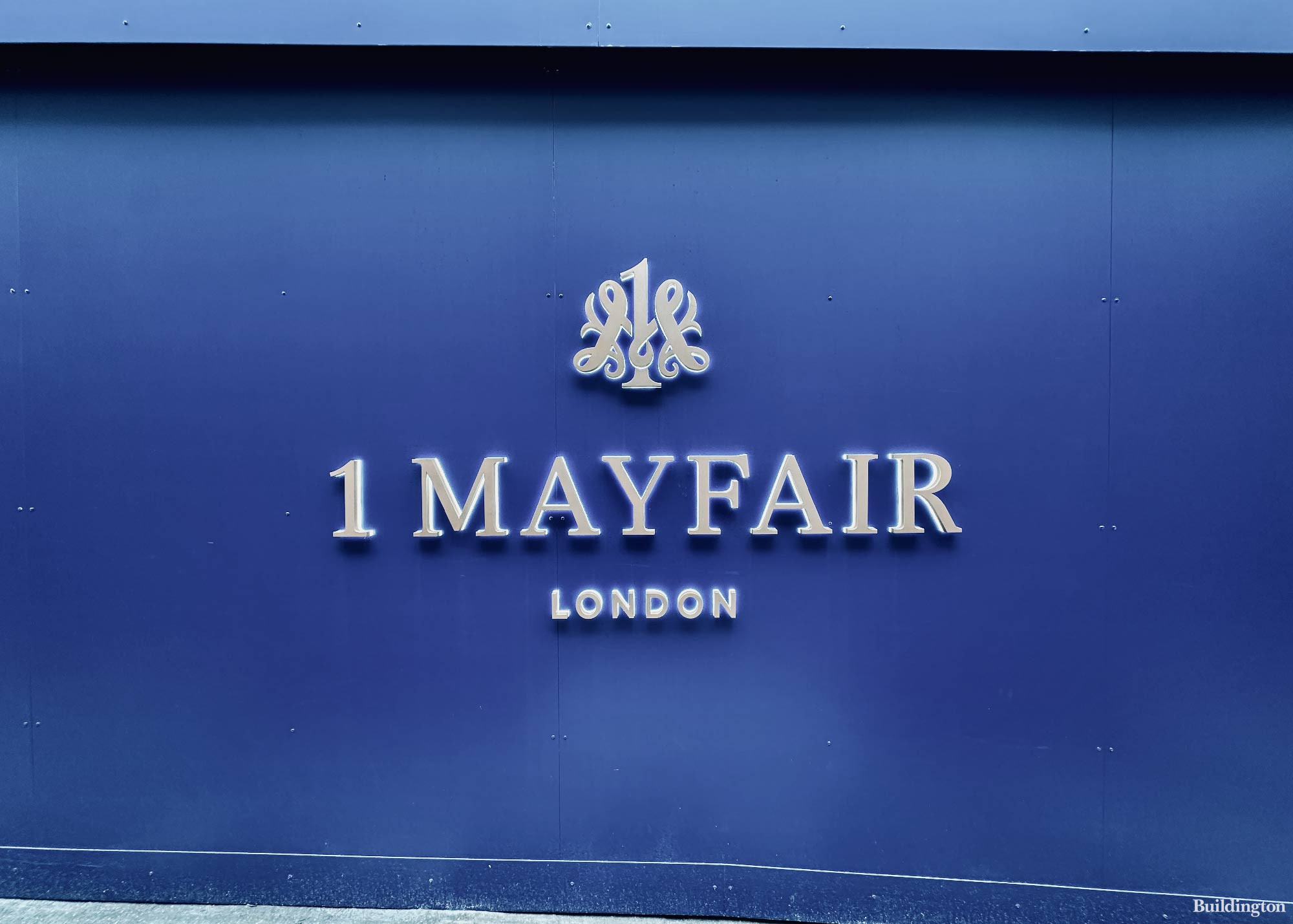 1 Mayfair development logo on the hoarding on South Audley Street in Mayfair, London W1 