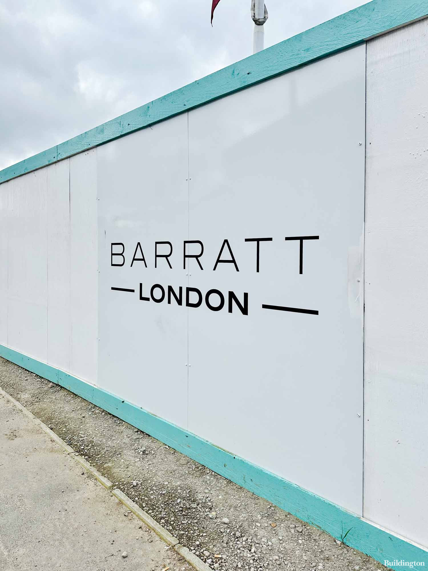 Royal Gateway hoarding with Barratt London logo in March 2024